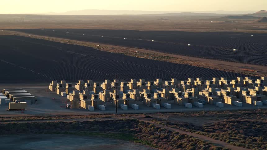 A solar farm covers the landscape