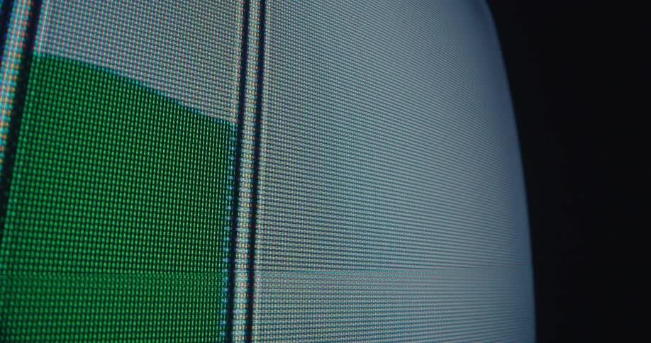 A closeup of a display screen shows a green band filling a graph over lightcolored squares