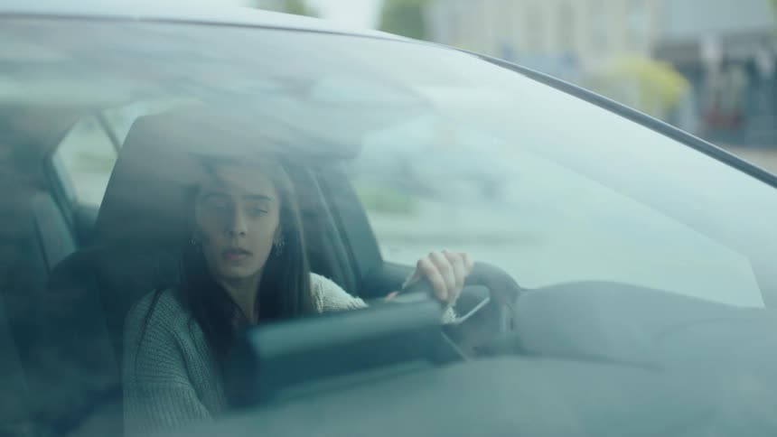 Woman driving a car