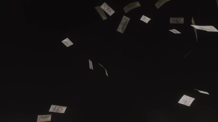 The money is falling with a black background