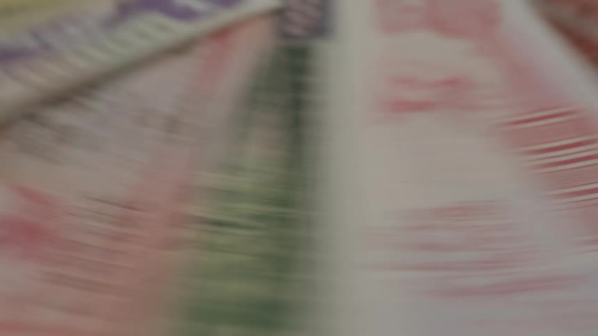 A circle of cash is spinning fast