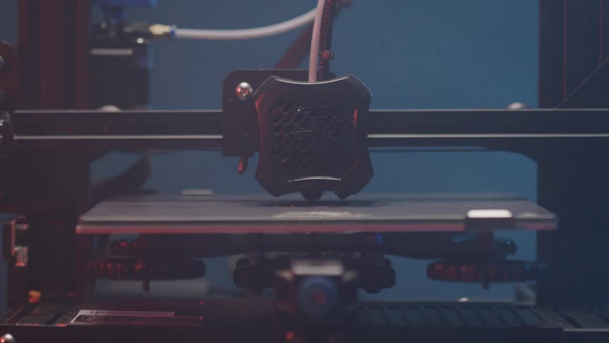 The machine is carving into a plate
