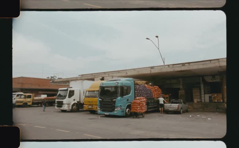 People are loading their trucks at the storage facility
