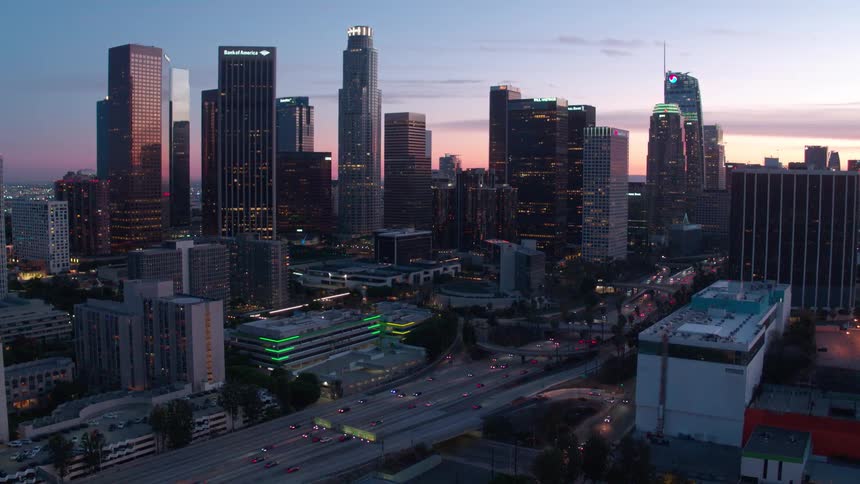 Aerial of a busy metropolitan city at sunset