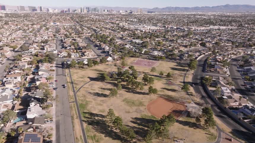 A baseball field is in the middle of the Las Vegas suburbs