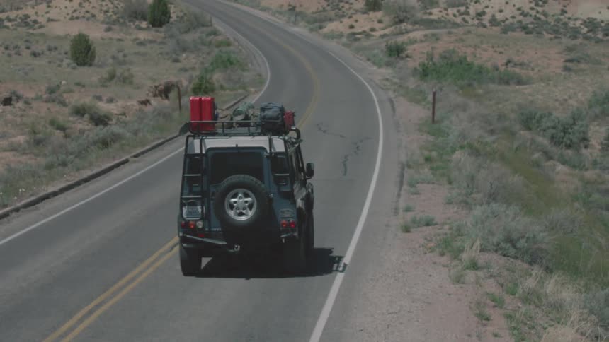 A jeep driving away