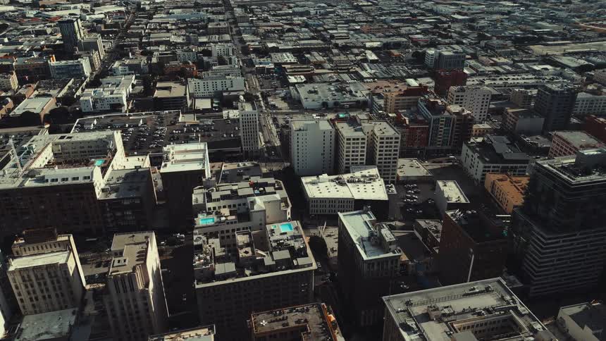 The buildings fill the landscape during the day