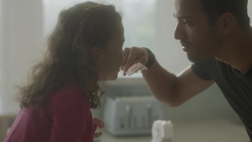 A child and father play