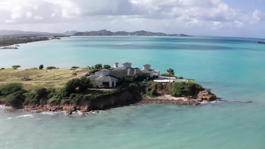 A large mansion on the edge of a peninsula