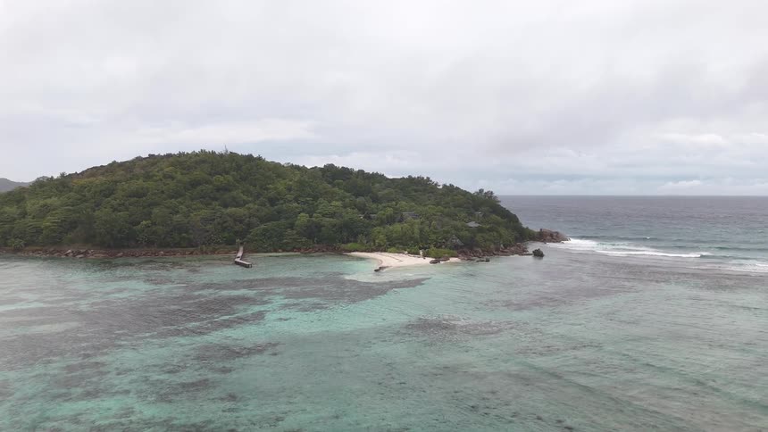The island is covered in trees