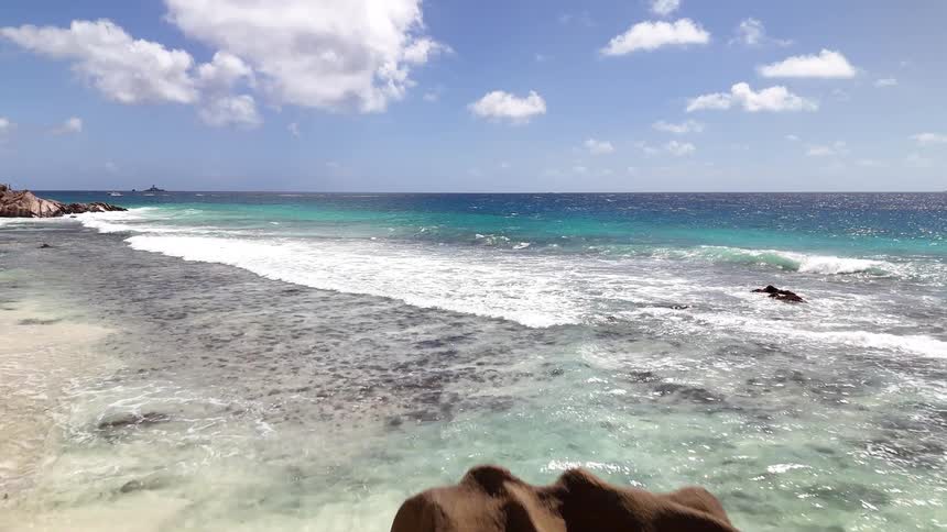 Blue waters surround the tropical island