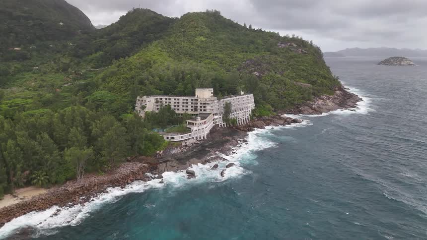 The hotel is surrounded by trees on the island