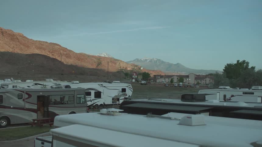 An rv park next to a highway