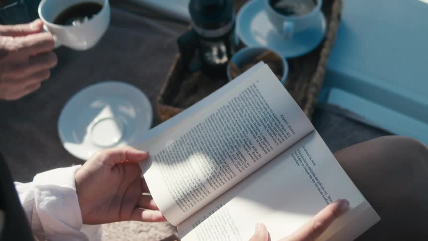 Person sitting reading a book