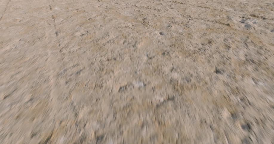 The long desert leads to the mountain range