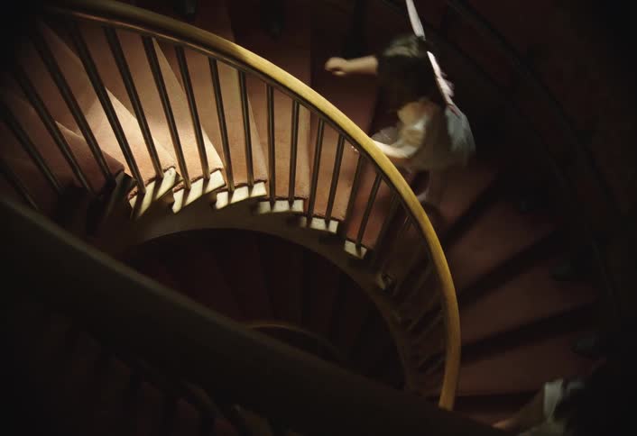 Two children climbing the stairs