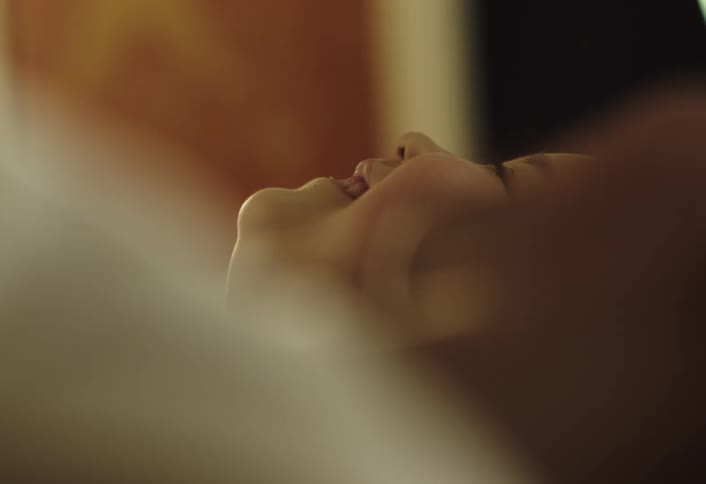 Person lying down smiling