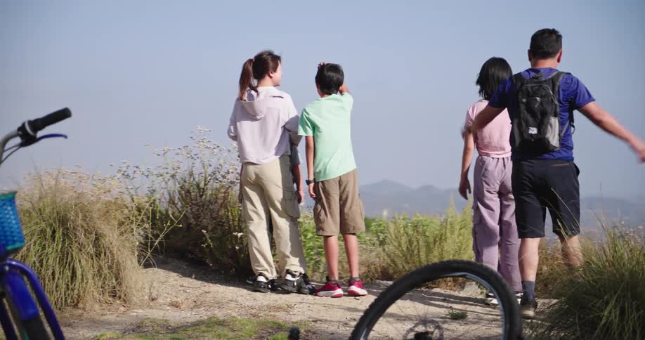 A family look out over the mountain