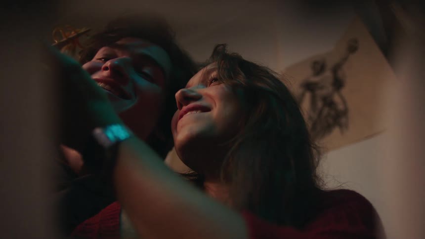 Couple eating pasta lovingly