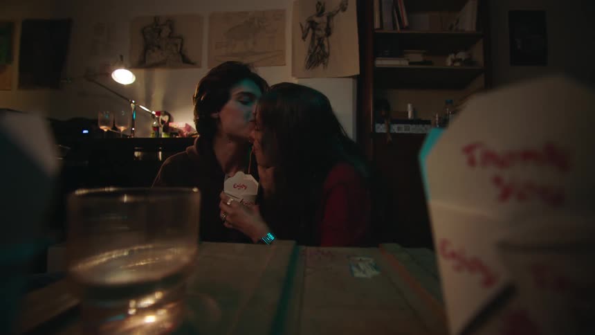 Couple eating pasta together