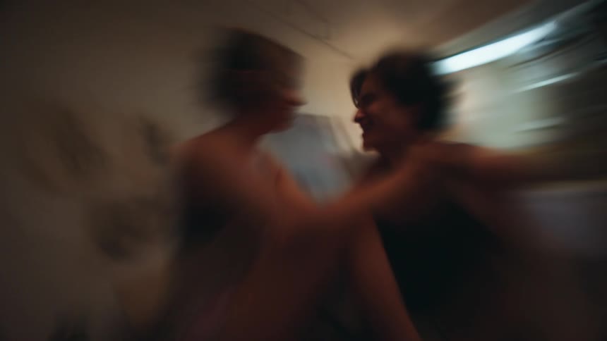 Couple in a room of the house in a romantic moment