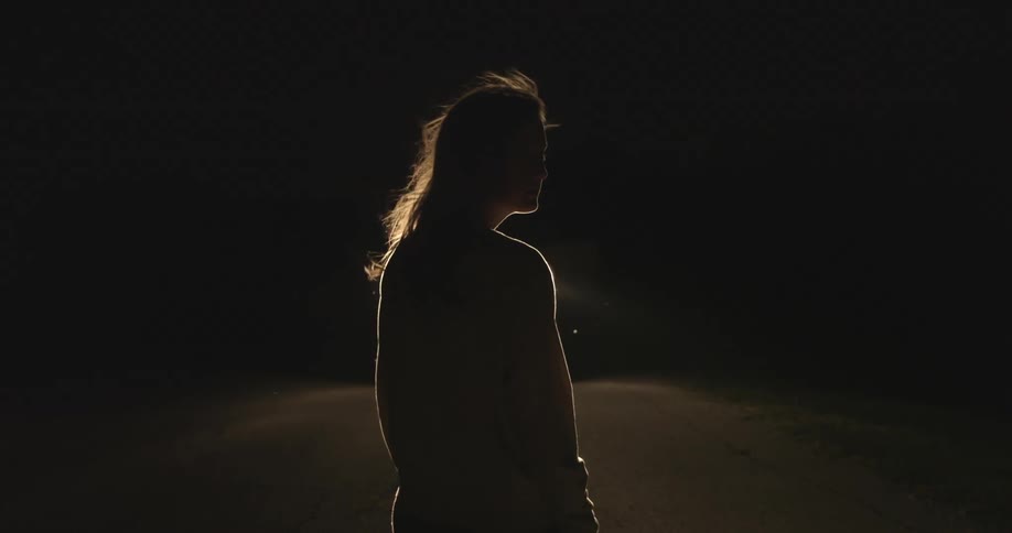 A person's hair blowing in the wind