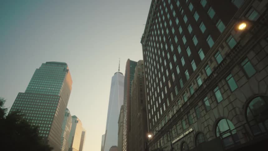 The buildings are tall and full of windows