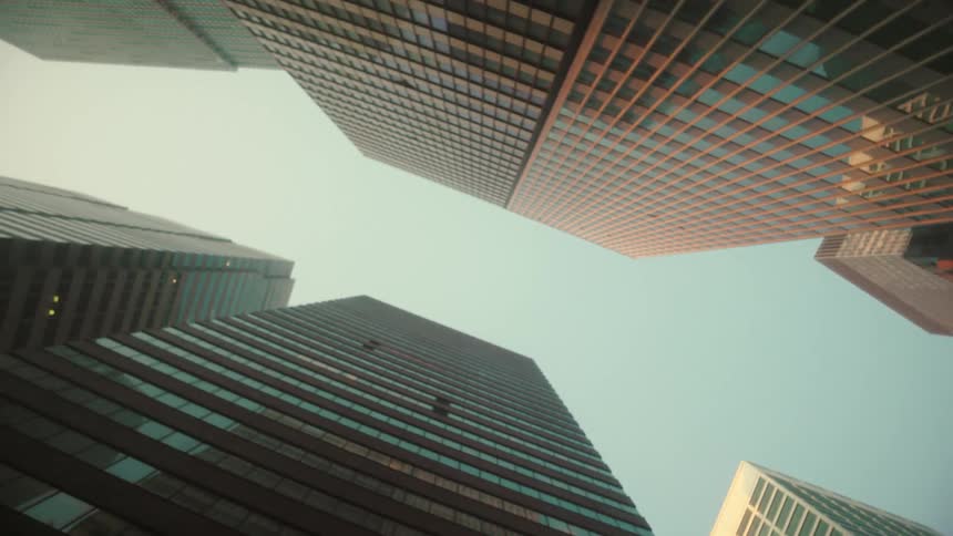 A city view with towers and highrise buildings at midday