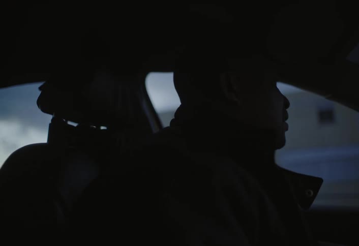 The man talks while he drives