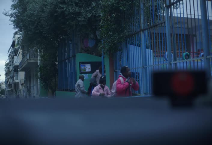 Children leaving school accompanied by an adult