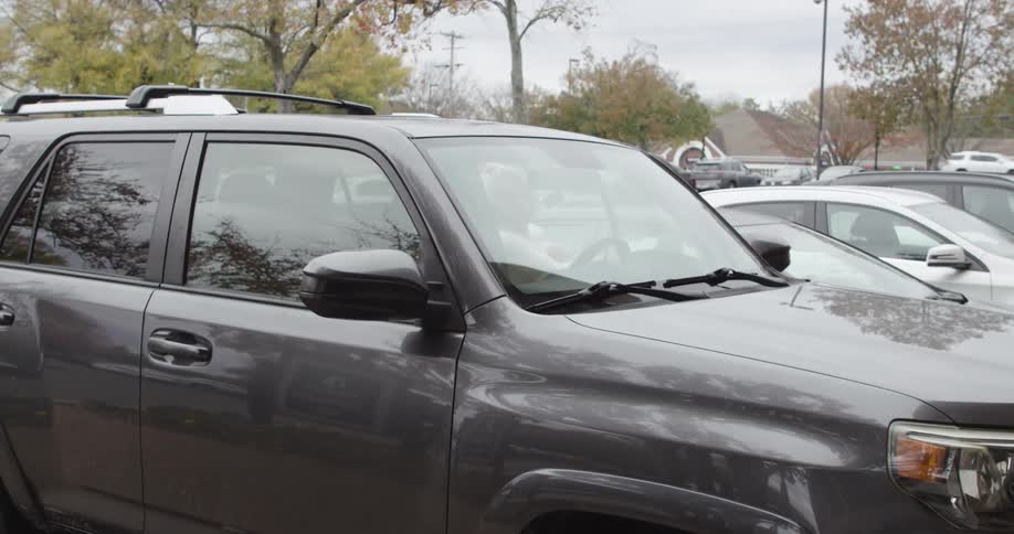 Woman getting into a car