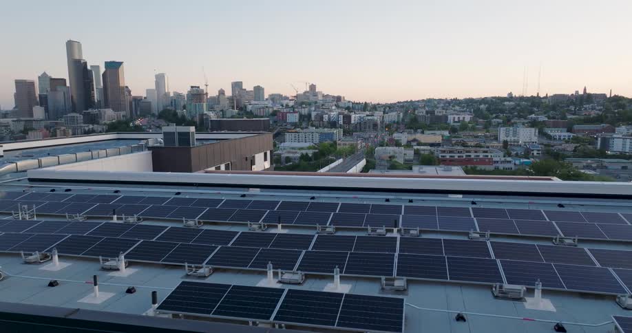 Solar panels line the roof of a brand new appartment complex