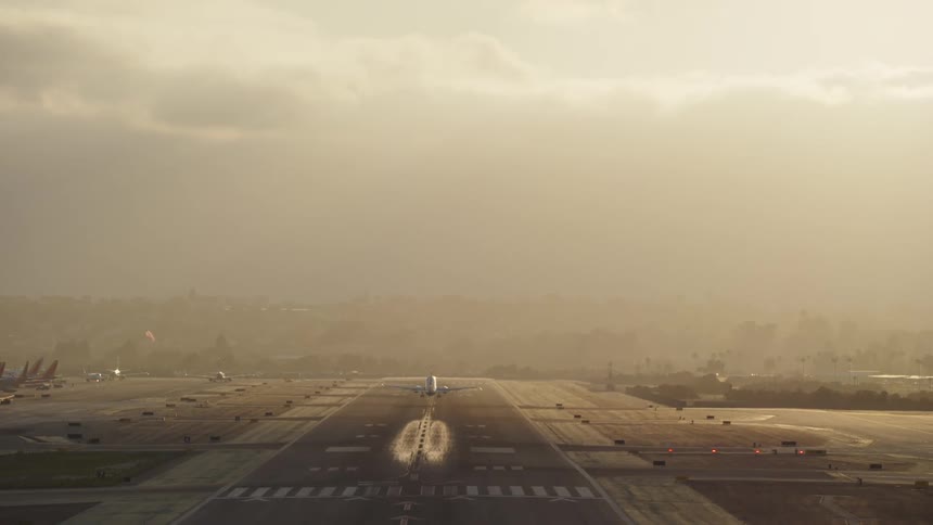 Plane taking off on a cloudy day