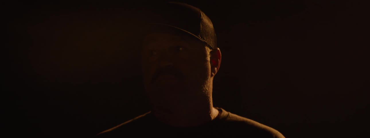 The man turns in the dark