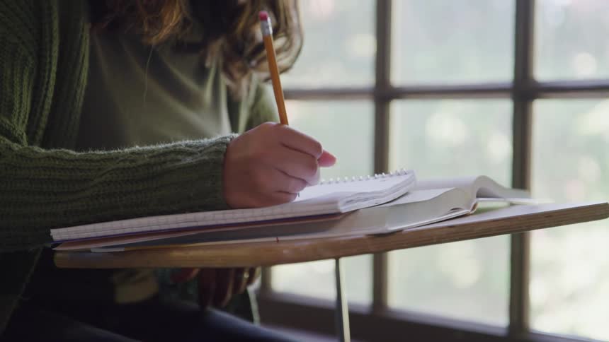 A student is writing in class