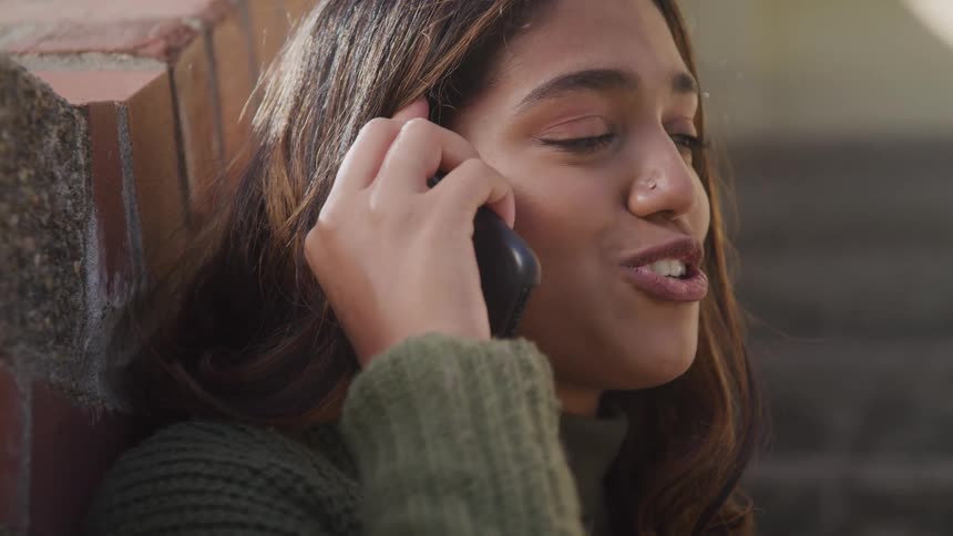 Woman talking on a call on smartphone