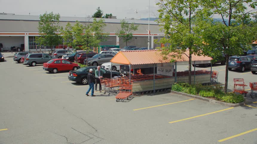 Two men have an argument at the cart corral