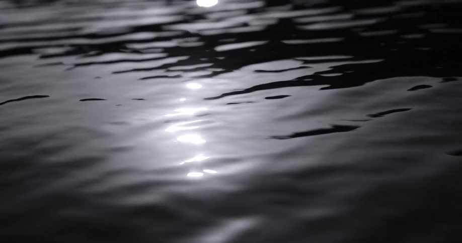 Reflection of the sun in the water of a lake
