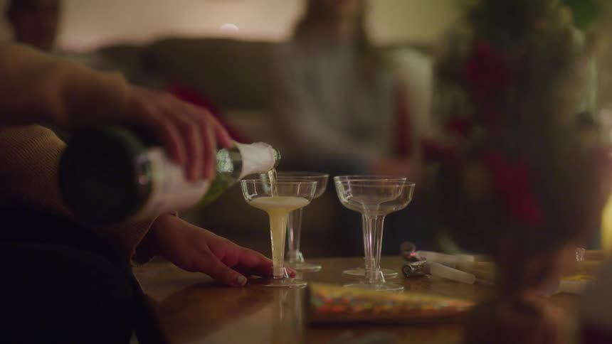Drinks are being poured at a party