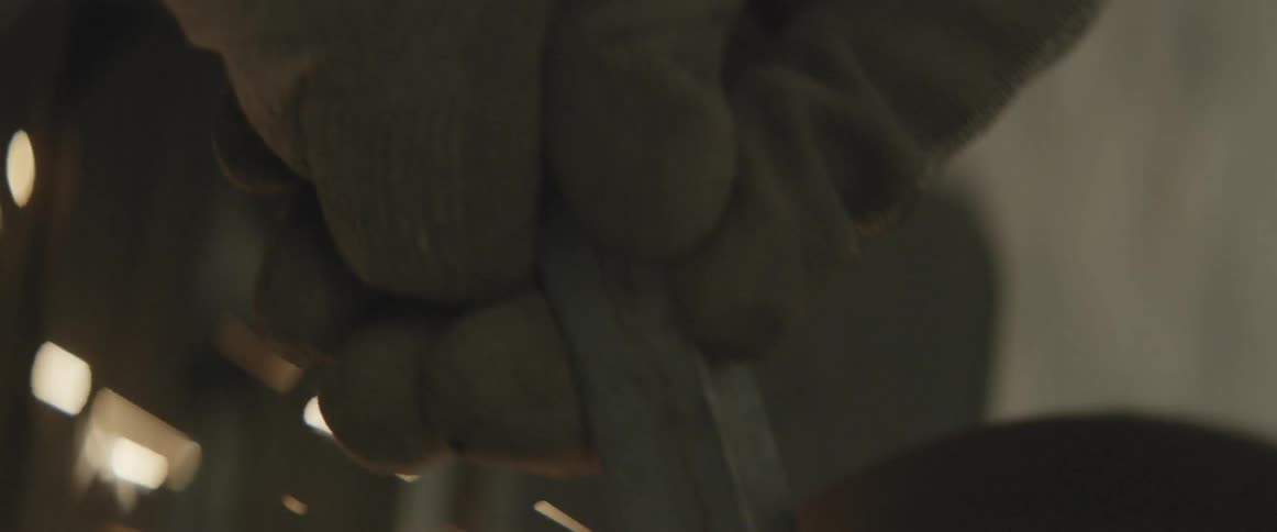 A tool is welding some stone