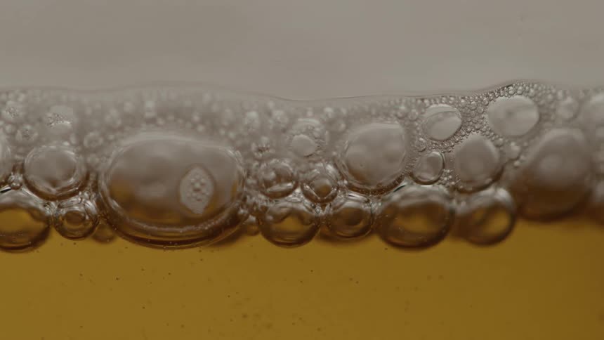 Beer bubbles in a glass cup