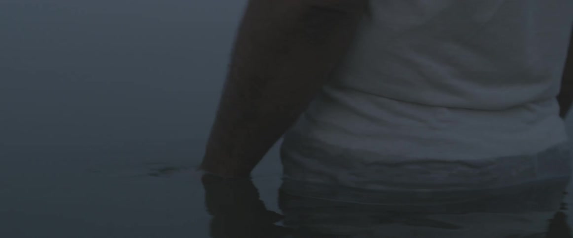 A person is wading in the water