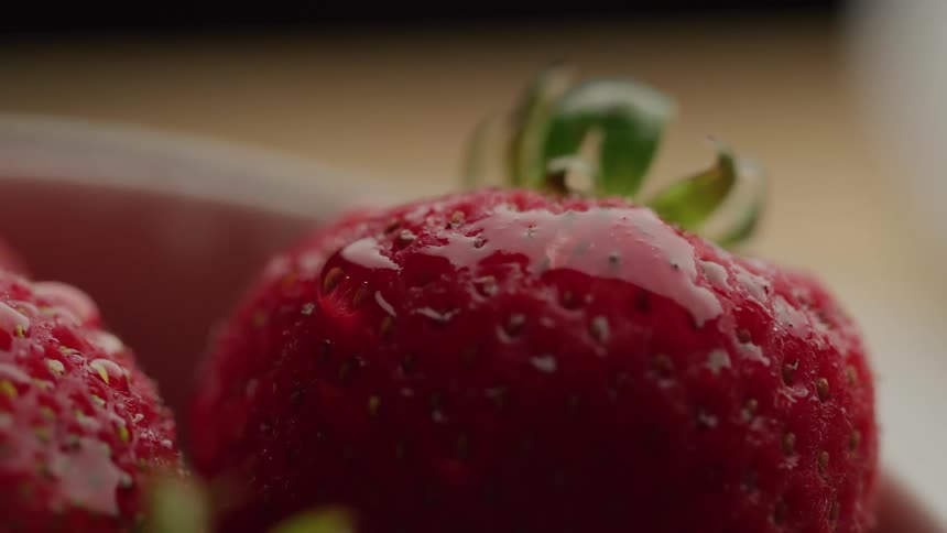 Strawberry fruits placed in a bowl indoors