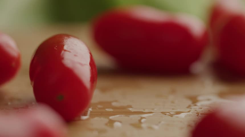 Small tomatoes falling