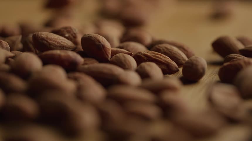 Almonds fall on each other