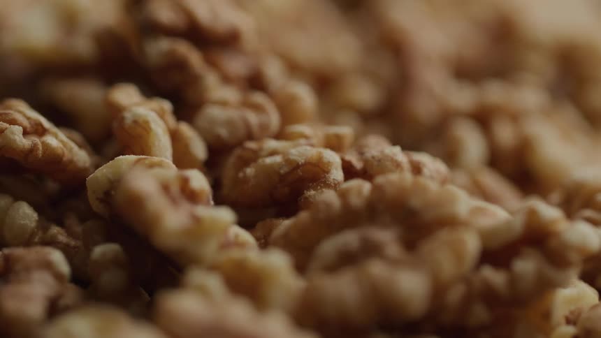 A close up clip of processed walnuts