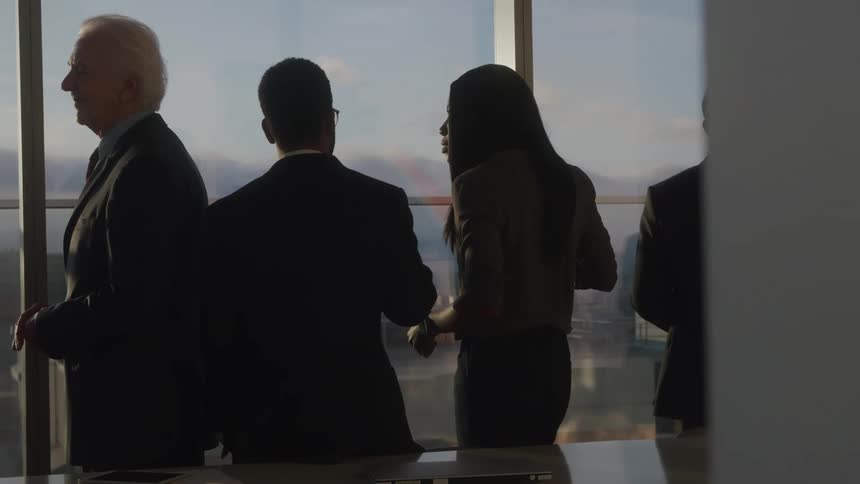 The conference room is full of talking people