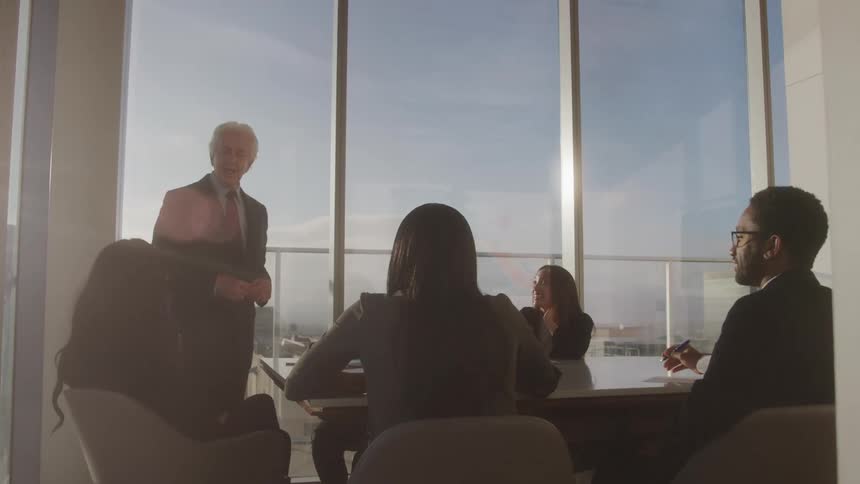 People talking in an office meeting