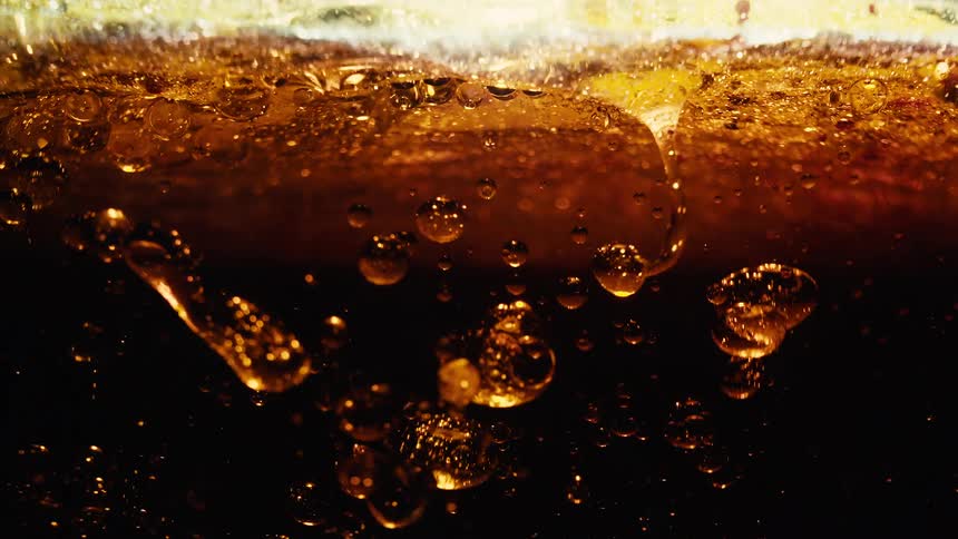 Glass with carbonated drink
