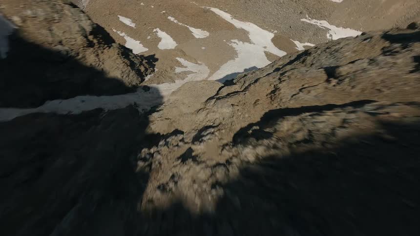 Rocky mountains with snow plates